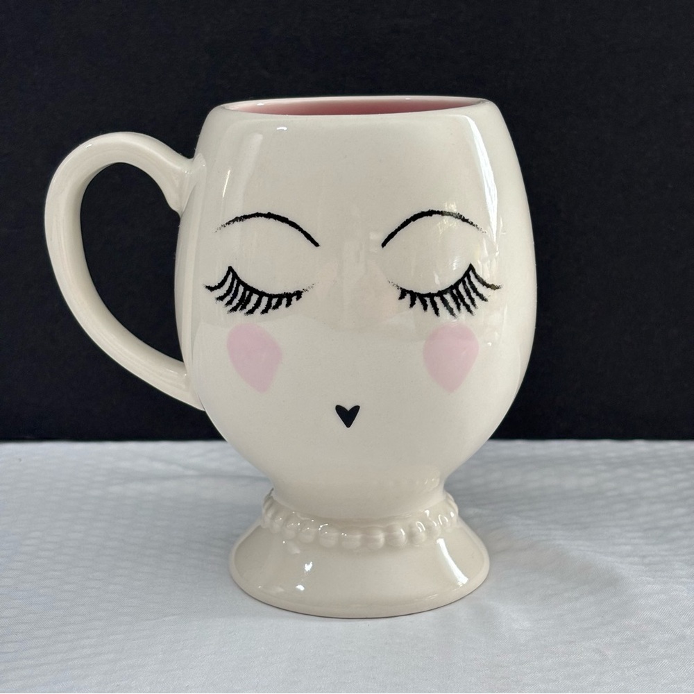 Vintage Schurman Retail Group Pedestal Face Mug with a pink interior.